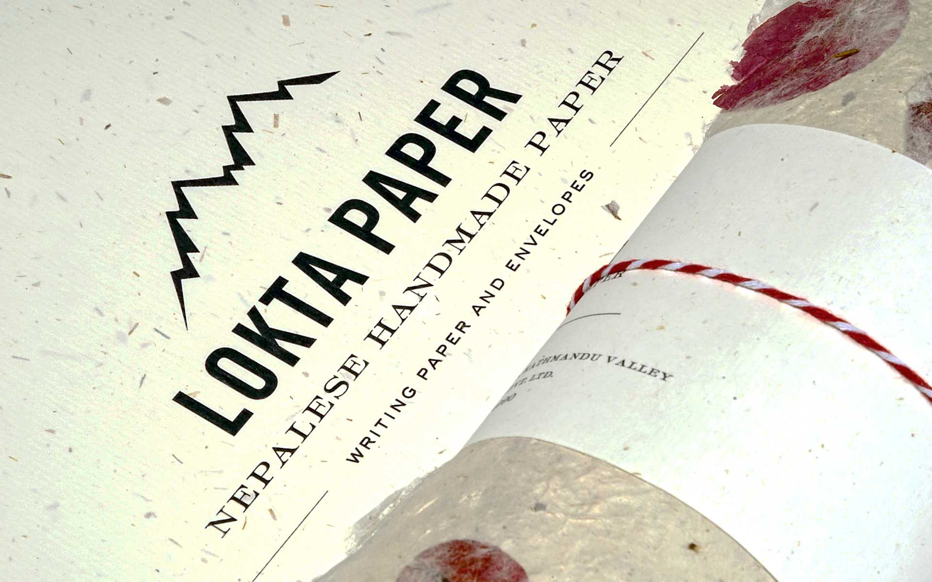 Abbildung einer Wortbildmarke für handgeschöpftes Lokta-Papier.